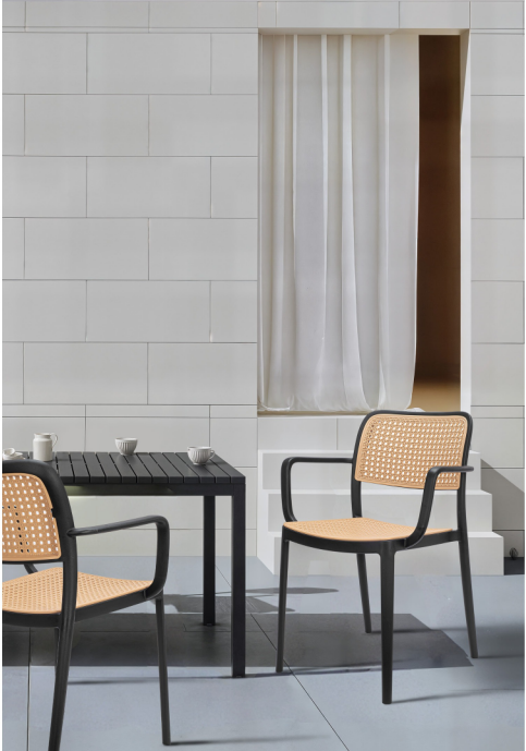 Alt text: BRAVO.PNG	Bravo and Bravo XR cane cafe chairs at a cafe table