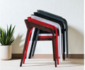 Alt text: CUBE (1).PNG	Cube cafe chairs stacked in black, red, brown and white