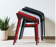 Alt text: CUBE (1).PNG	Cube cafe chairs stacked in black, red, brown and white